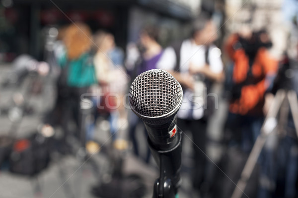 Mikrofon fókusz elmosódott közönség megbeszélés hírek Stock fotó © wellphoto