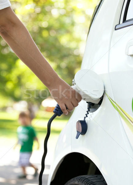 Charging battery of an electric car Stock photo © wellphoto