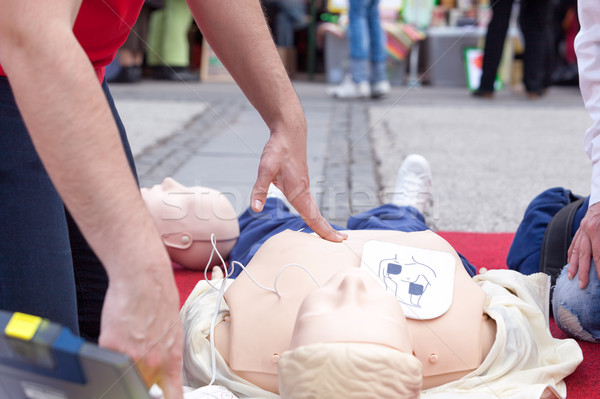 Defibrillation training. First aid. CPR. Stock photo © wellphoto