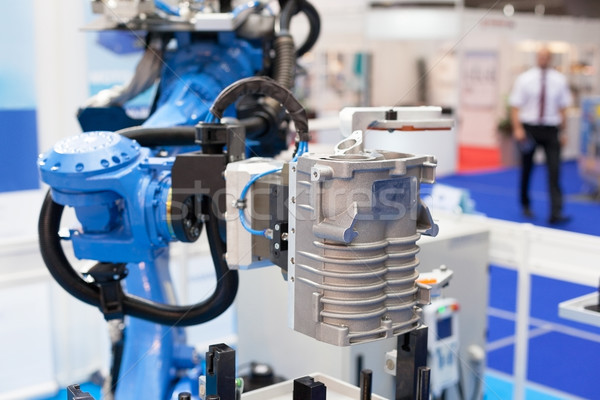Industrial assembly robot arm Stock photo © wellphoto