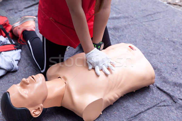 First aid training concept. CPR. Cardiac massage. Stock photo © wellphoto