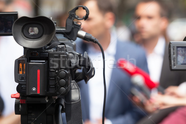 Hírek konferencia újságírás sajtótájékoztató videókamera mikrofon Stock fotó © wellphoto