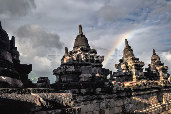 Clouds and Rainbow Buddist temple Borobudur complex in Yogjakart Stock photo © weltreisendertj
