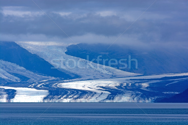 Glacier Coming Out of the Clouds Stock photo © wildnerdpix