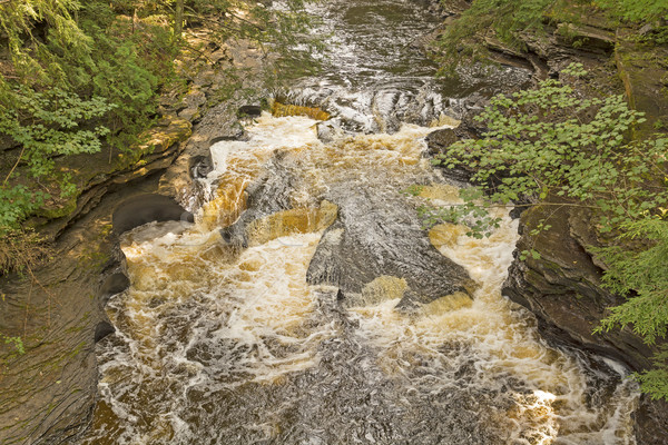 Rushing Water over Unusual Rocks Stock photo © wildnerdpix