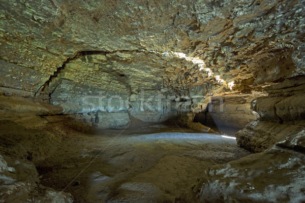 Cavern with natural light from overhead crack Stock photo © wildnerdpix