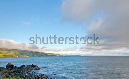 Early morning clouds on a sea coast Stock photo © wildnerdpix