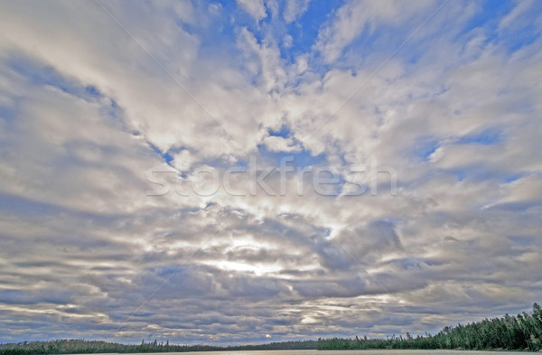 Nap törik felhők tó határ tájkép Stock fotó © wildnerdpix