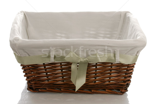 fabric lined wicker basket with bow isolated on white background Stock photo © willeecole