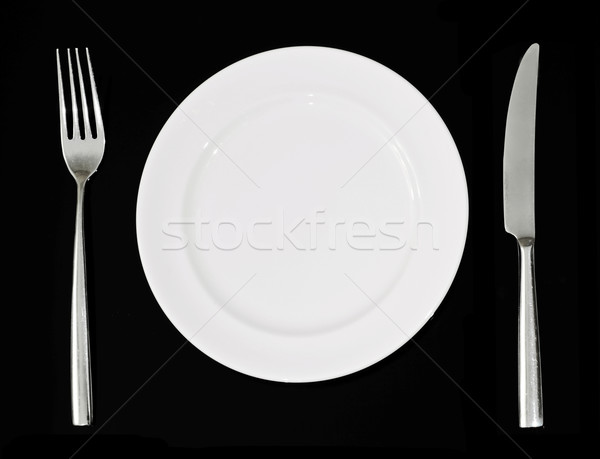 Plaque couteau fourche repas temps table Photo stock © winnond