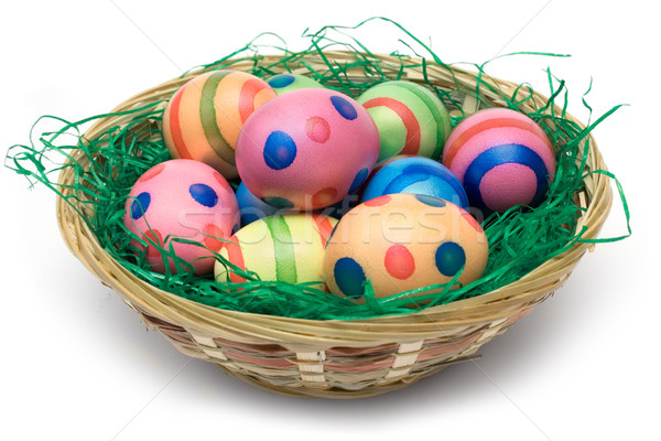 Kosár húsvéti tojások köteg színes tojások fából készült izolált Stock fotó © winterling