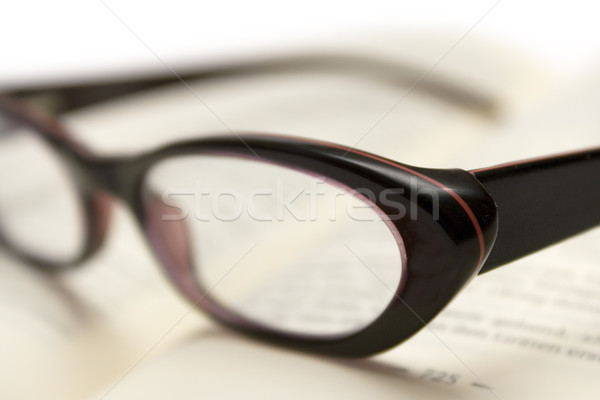 Könyvmoly szemüveg nyitott könyv sekély szem könyvek Stock fotó © winterling
