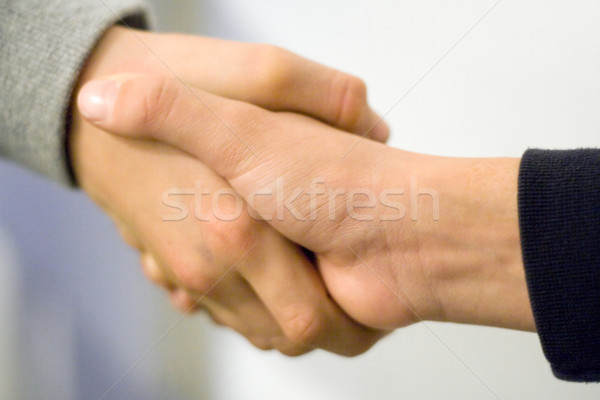 Jungen Händeschütteln zwei jungen seicht Hände Stock foto © winterling