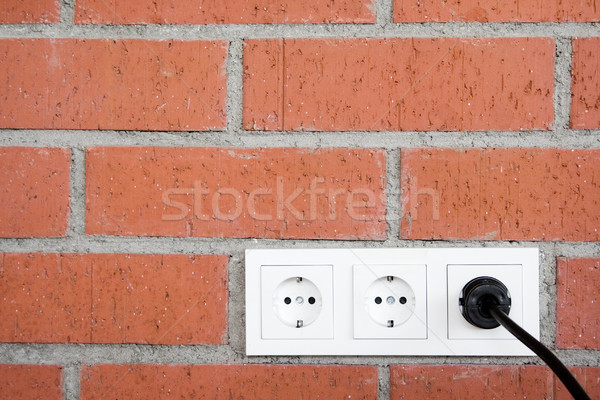 Brick Wall with Power Outlet Stock photo © winterling