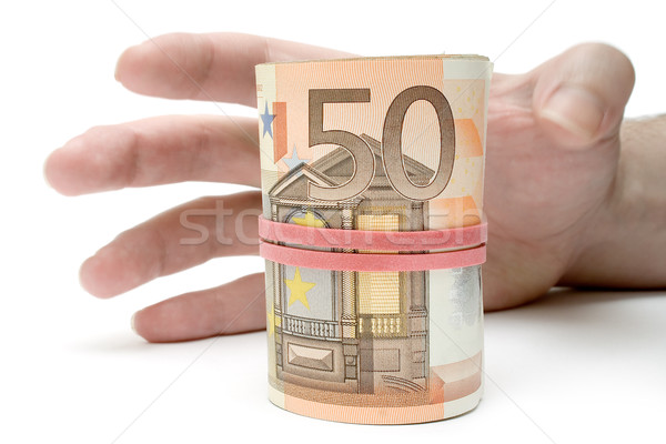 Rollen Geld Hand Euro Rechnungen isoliert Stock foto © winterling