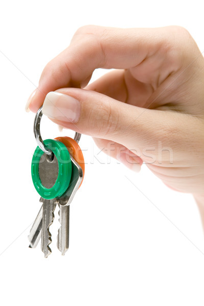 Halten Haufen Schlüssel weiblichen Hand isoliert Stock foto © winterling