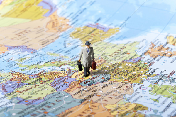 [[stock_photo]]: Voyageur · miniature · homme · carte · du · monde · femme · monde