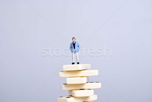 Domino une homme permanent cubes [[stock_photo]] © wisiel