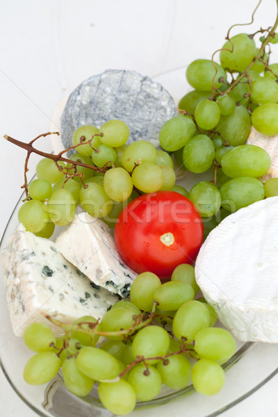 Stock photo: Cheese with white grapes and tomato
