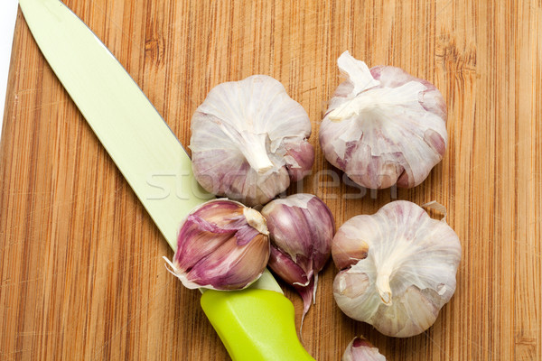 Stock photo: Garlic on the wooden table 