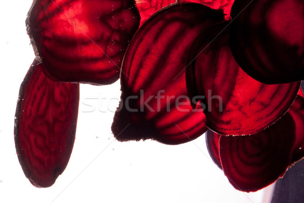 Greggio acqua alimentare sfondo rosso Foto d'archivio © wjarek