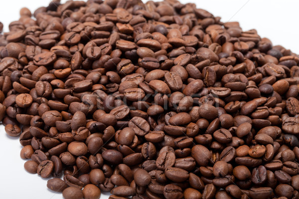 Stock photo: coffee beans close up isolated on white