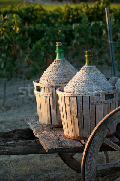 Stock photo: A cart loaded with wine bottles