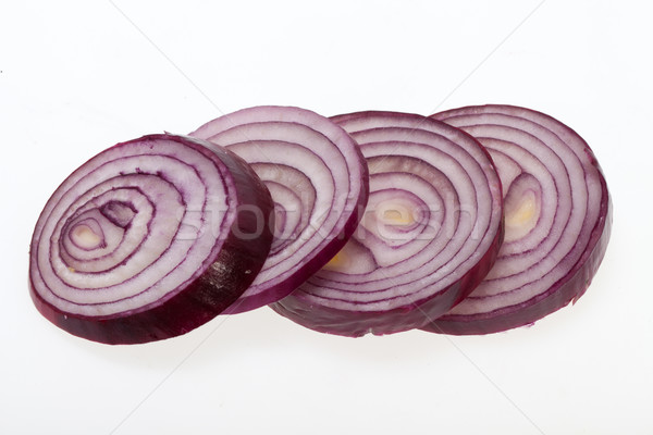Stock photo: sliced onion isolated on white 