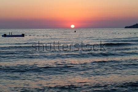 Stock photo: Sunset over the sea 