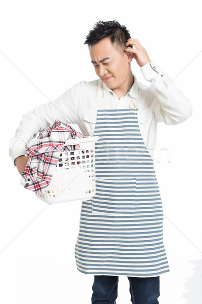 male holding a laundry basket Stock photo © wxin