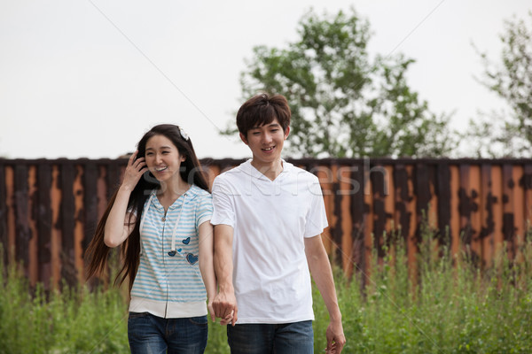 Jovem amantes asiático casal jogar ao ar livre Foto stock © wxin