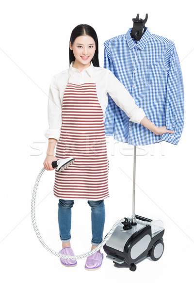 Giovani casalinga isolato bianco donna Foto d'archivio © wxin