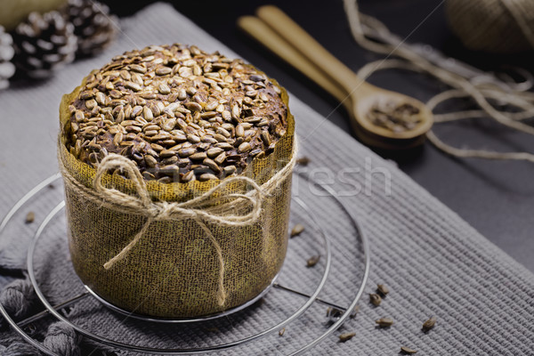 Integral Bread with Sunflower on Black Table, Gray Cloth, Rope a Stock photo © x3mwoman
