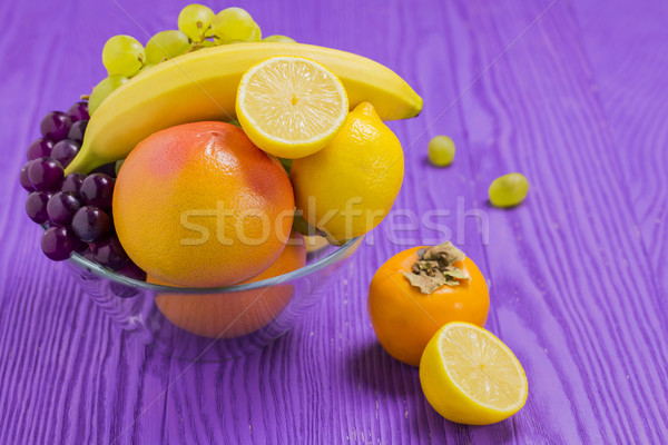 Gyümölcsök banán grapefruit citrom sötét fehér Stock fotó © x3mwoman