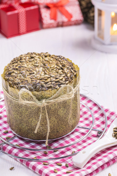 Sunflower Bread with crumbs, New Year Cloth, Teaspoons on White  Stock photo © x3mwoman