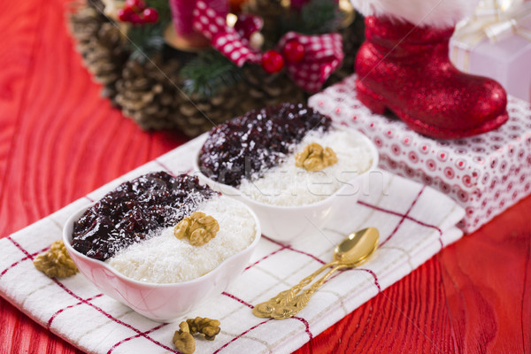 Rice Pudding and Strawberry Jam with Nuts, New Year Decoration i Stock photo © x3mwoman