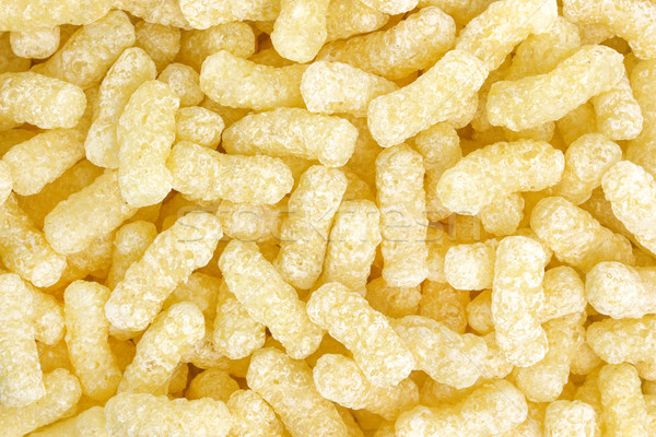 Crunchy corn sticks background Stock photo © xamtiw