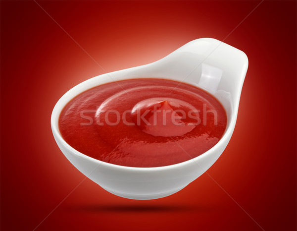 Ketchup in white bowl isolated. Portion of tomato sauce. With clipping path. Stock photo © xamtiw