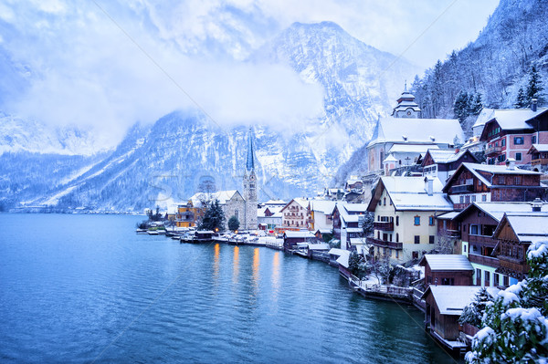Hallstatt wooden village on lake in snow white, Austria Stock photo © Xantana