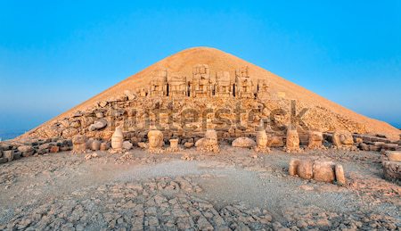 Statues on the summit of Mount Nemrut in Turkey on sunrise Stock photo © Xantana