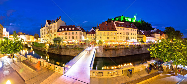 Evening panorama of Ljubljana river, architecture and castle Stock photo © xbrchx