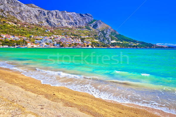 Stock photo: Town of Omis sand beach and Biokovo mountain coastline view