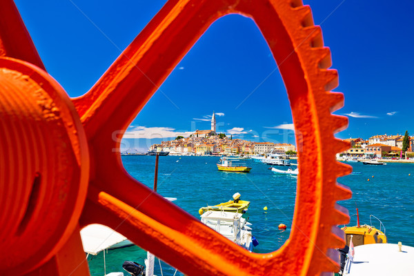 Stock photo: Town of Rovinj waterfront view through rusty boat ramp