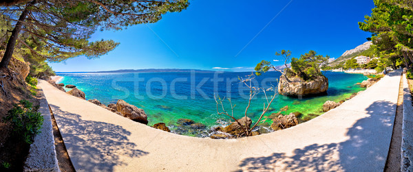 Idyllic islet on Punta Rata beach in Brela panoramic view Stock photo © xbrchx