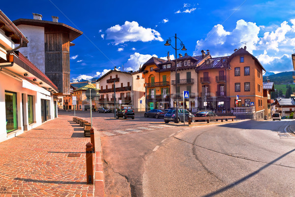 Stock photo: Cortina D' Ampezzo street and Alps peaks panoramic view