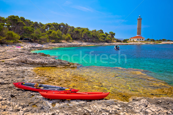Veli Rat lighthouse and turquoise beach view Stock photo © xbrchx