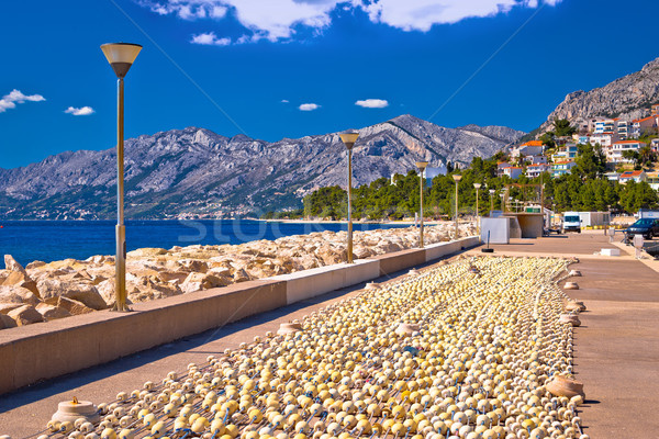 Baska Voda breakwater and fishing nets view Stock photo © xbrchx