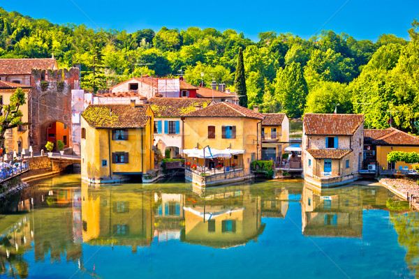 Mincio river and idyllic village of Borghetto view Stock photo © xbrchx