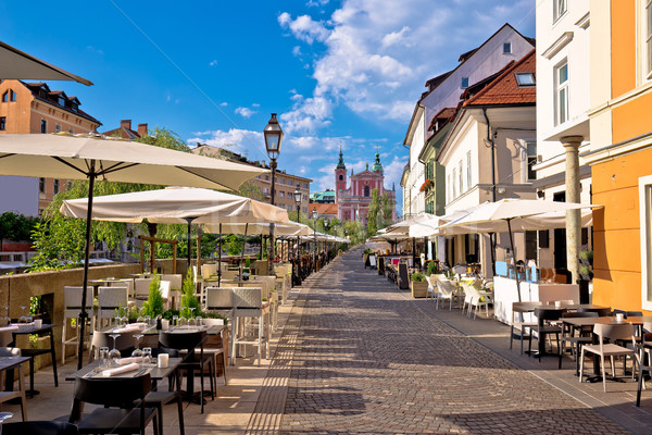 Ljubljana riverfront promenade walkway summer view Stock photo © xbrchx