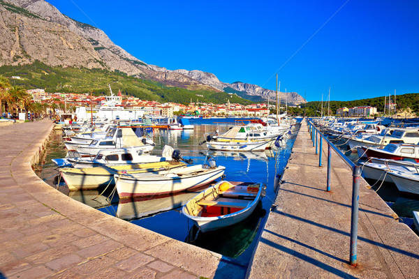 Stock photo: Colorful Makarska harbor and waterfront under Biokovo mountain v